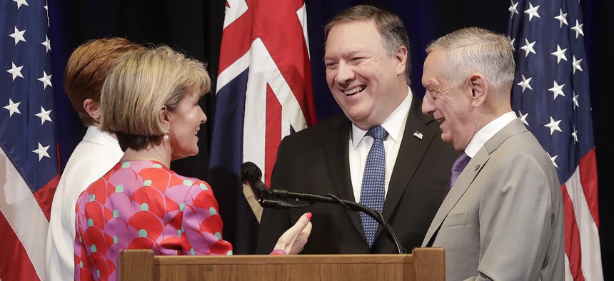 U.S. Sec. of State Mike Pompeo and U.S. Sec. of Defense Jim Mattis greet Australia Foreign Affairs Minister Julie Bishop and Australia Minister for Defense Marise Payne after a Australia-U.S. Ministerial Consultations conference July 24, 2018. 