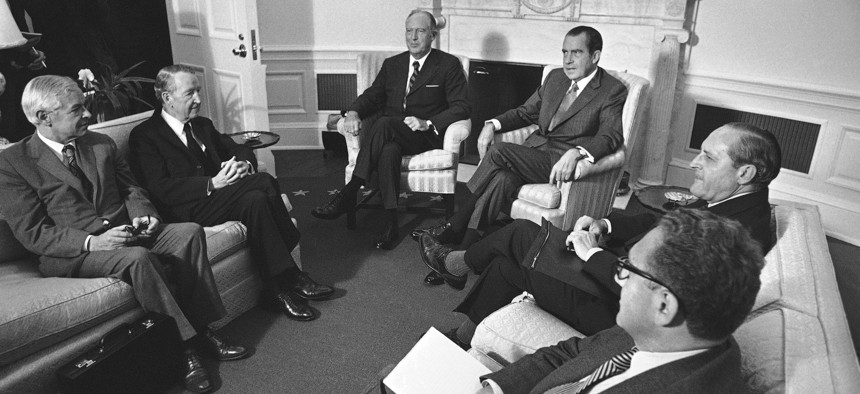President Richard Nixon and Secretary of State William P. Rogers meet at the White House in Washington on May 21, 1971 with delegates to the Strategic Arms Limitation Talks.