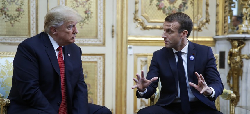 President Donald Trump meets with French President Emmanuel Macron inside the Elysee Palace in Paris Saturday Nov. 10, 2018.