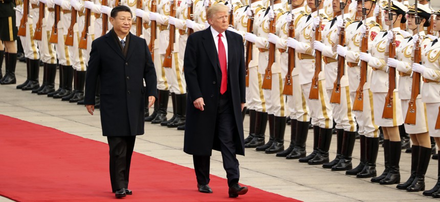President Donald Trump and Chinese President Xi Jinping participate in a welcome ceremony at the Great Hall of the People, Thursday, Nov. 9, 2017, in Beijing, China.