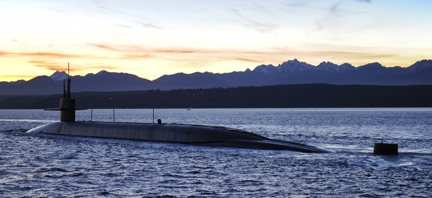 The ballistic-missile submarine USS Nevada (SSBN 733) transits the Puget Sound on its way to its homeport, Naval Base Kitsap-Bangor in Poulsbo, Wash. Jan. 14, 2015.