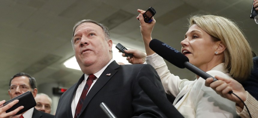 Secretary of State Mike Pompeo speaks to members of the media after leaving a closed door meeting about Saudi Arabia, Wednesday, Nov. 28, 2018, on Capitol Hill in Washington.