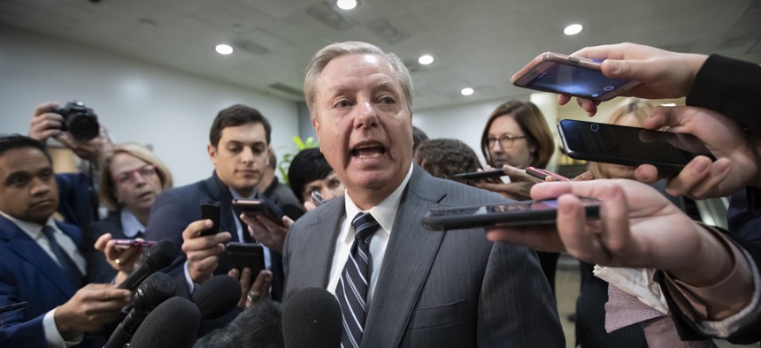 Sen. Lindsey Graham, R-S.C., speaks to reporters at the Capitol after a briefing by CIA Director Gina Haspel on the slaying of Saudi journalist Jamal Khashoggi in Washington on Dec. 4, 2018.