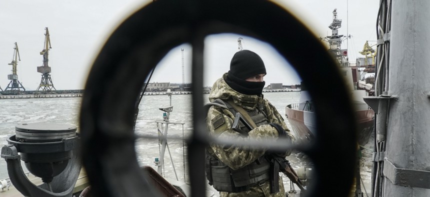 A Ukrainian serviceman stands on board a coast guard ship in the Sea of Azov port of Mariupol, eastern Ukraine, Monday, Dec. 3, 2018. The Ukrainian military has been on increased readiness as part of martial law introduced in the country.