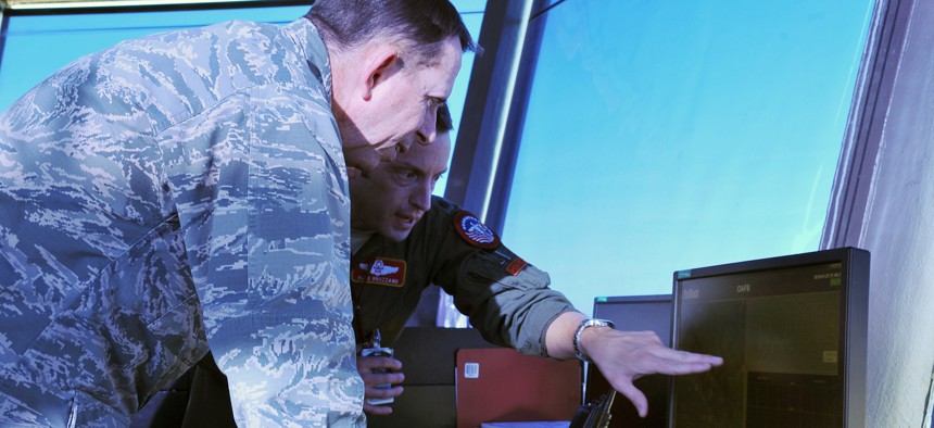 U.S. Air Force Maj. Gen. John N.T. Shanahan, 25th Air Force commander, observes the bird strike avoidance radar system inside the air traffic control tower on Offutt Air Force Base, Neb., Jan. 27. 