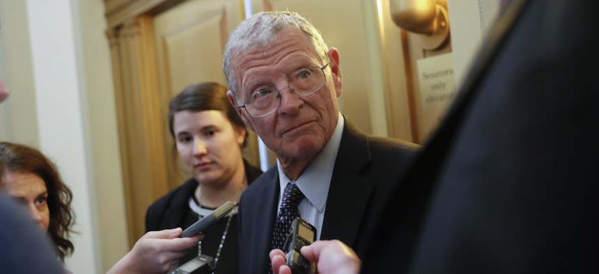 Sen. James Inhofe, R-Okla., stops to speak to members of the media after attending the weekly GOP conference luncheon at the Capitol in Washington, Tuesday, Aug. 28, 2018.
