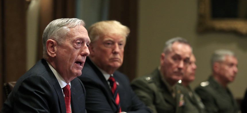 From left, Defense Secretary Jim Mattis speaks during a briefing with President Trump and senior military leaders in the Cabinet Room at the White House in Washington, Tuesday, Oct. 23, 2018.