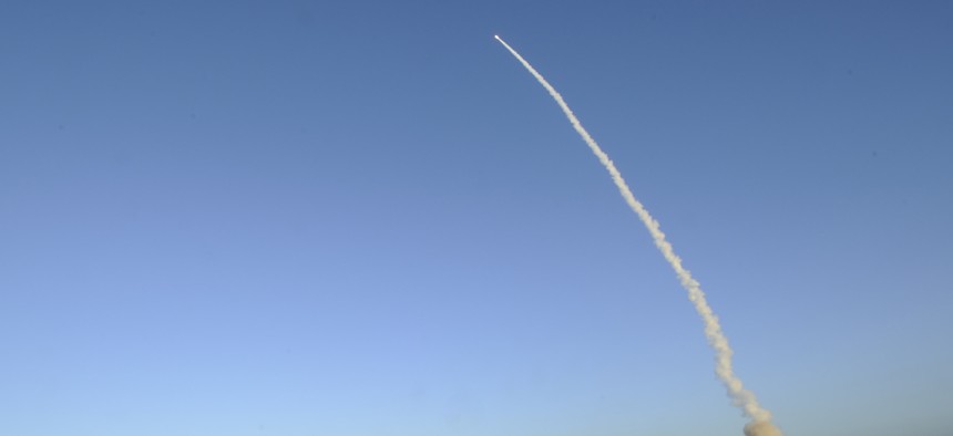 An unarmed LGM-30G Minuteman III intercontinental ballistic missile launches during an operational test at Launch Facility-4 on Vandenberg Air Force Base, Calif., in 2014.