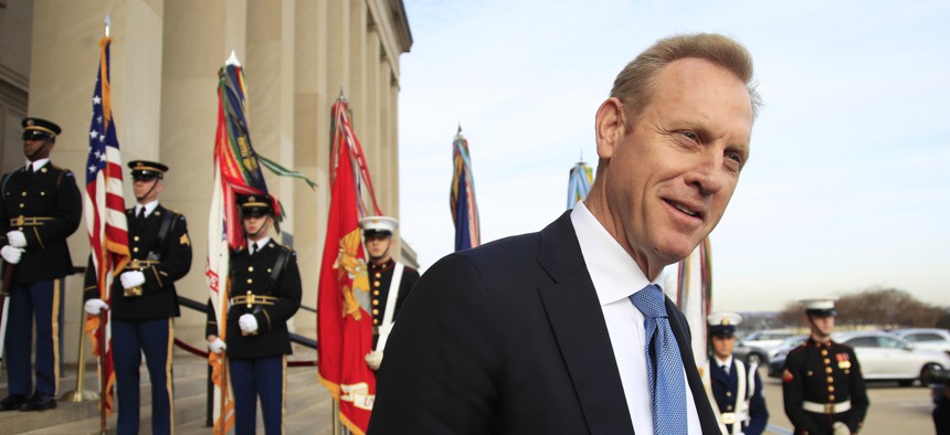 In this Wednesday, Dec. 19, 2018, file photo, Deputy Defense Secretary Patrick Shanahan, speaks to reporters on the steps of the River entrance of the Pentagon.