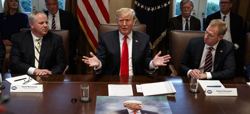 President Donald Trump speaks during a cabinet meeting at the White House, Wednesday, Jan. 2, 2019, with acting Defense Secretary Patrick Shanahan, right.