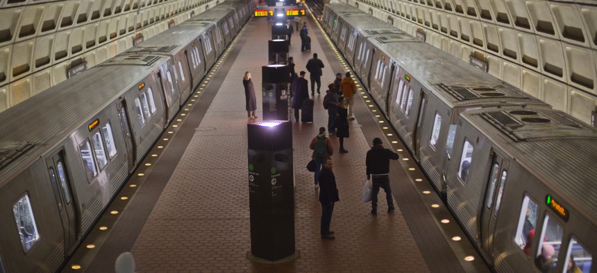 Passengers board subway trains at the Naval Yard-Ballpark Metro Station, Thursday, Feb. 8, 2018, part of the public transit network for Washington.