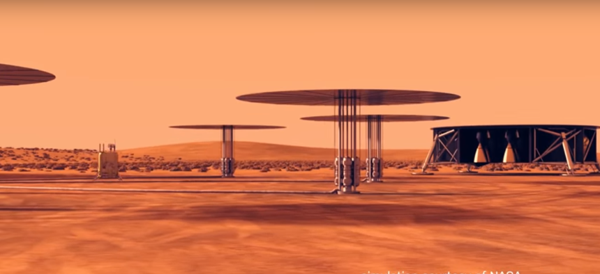 A still shot from a NASA simulation showing how small nuclear reactors might power colonies on Mars.
