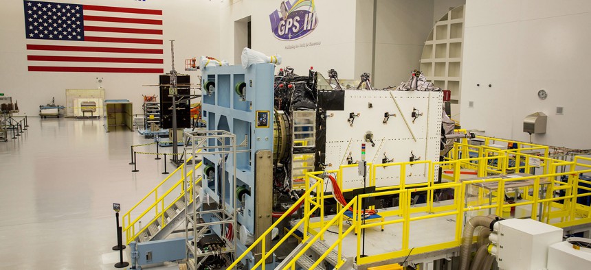A GPS III satellite being built at a Lockheed Martin factory in Colorado. Harris builds the satellite's navigation payload.