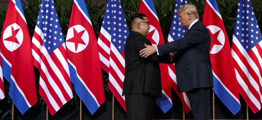 President Donald Trump meets with North Korean leader Kim Jong Un on Sentosa Island, Tuesday, June 12, 2018, in Singapore. 