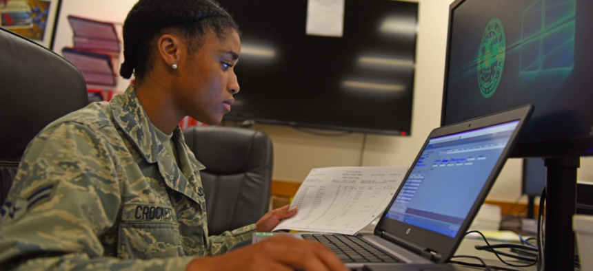 U.S. Air Force Airman 1st Class Rebecca Crockett, 77th Fighter Squadron aviation resource management journeyman, inputs an F-16CM Fighting Falcon pilot’s flying hours into a database at Shaw Air Force Base, S.C., Aug. 6, 2018.