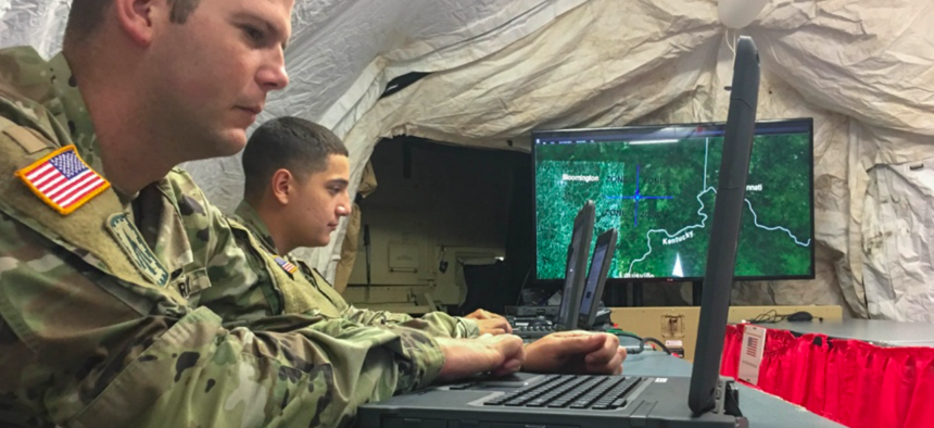Soldiers from the 94th Army Air and Missile Defense Command, track an unmanned aerial systems (UAS) threat during a scenario as part of Black Dart 18 on Muscatatuck Urban Training Center, Indiana, Sept. 17.