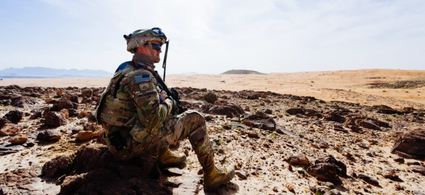 A U.S. soldier surveys a training ground near Kandahar, Afghanistan, March 14, 2017. 