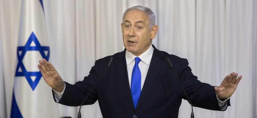 In this Thursday, Feb. 21, 2019 file photo, Israeli Prime Minister Benjamin Netanyahu delivers a statement in Ramat Gan, Israel.