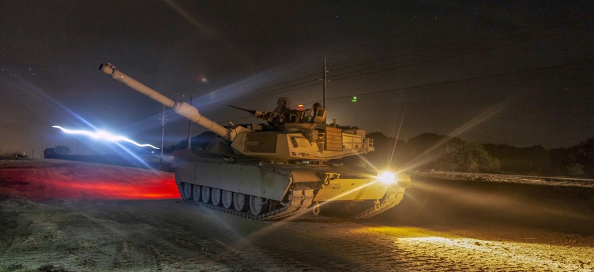 A U.S. Army M1 abrams tank works in unison with tanks from the Polish armed forces during live-fire and maneuvering training in Poland, Nov. 14, 2018, as part of joint training exercise Anakonda.
