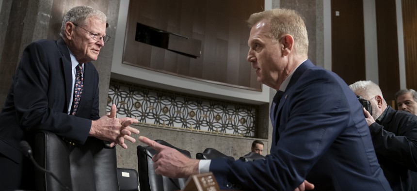 Senate Armed Services Committee Chairman Jim Inhofe, R-Okla., left, welcomes Acting Defense Secretary Patrick Shanahan to testify on the Department of Defense budget, on Capitol Hill in Washington, Thursday, March 14, 2019.