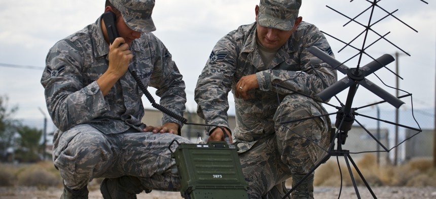 5G wireless technology might replace older radios like this one operated by two airmen in 2013 at Nellis Air Force Base, Nev. 