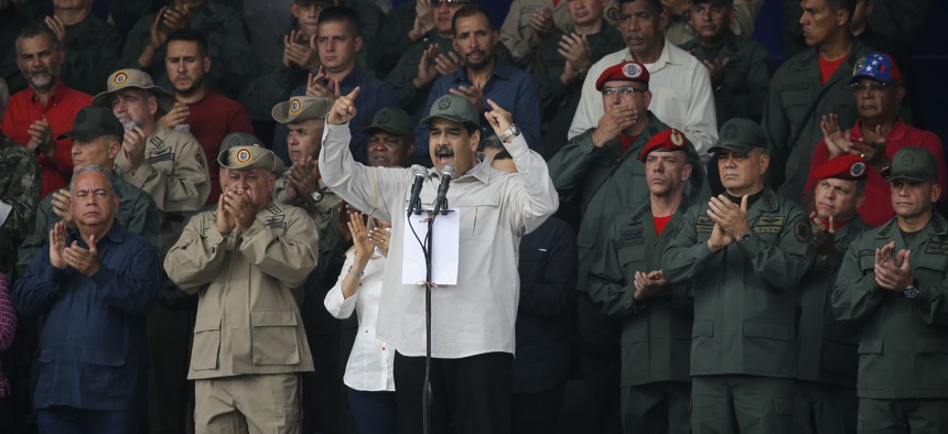 Venezuela's President Nicolas Maduro, speaks during the tenth anniversary celebration of the Bolivarian militia in Caracas, Venezuela, Saturday, April 13, 2019.