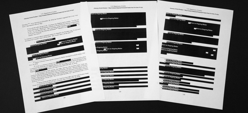 Special counsel Robert Mueller's redacted report on the investigation into Russian interference in the 2016 presidential election is photographed Thursday, April 18, 2019, in Washington.