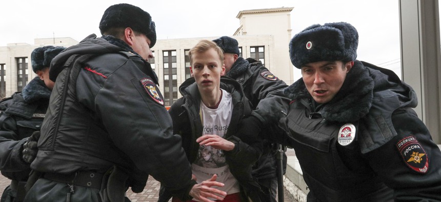 Police officers detain a demonstrator after the Free Internet rally in response to a bill making its way through parliament calling for all internet traffic to be routed through servers in Russia — making VPNs  ineffective in Moscow.