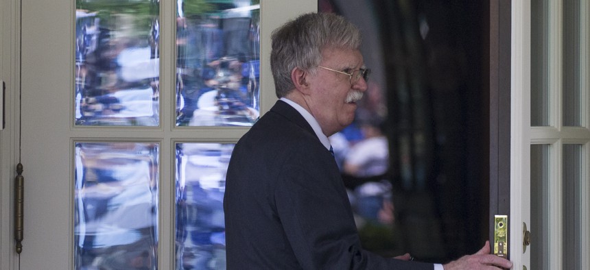 National Security Adviser John Bolton enters the West Wing of the White House, Friday, May 3, 2019, in Washington. 
