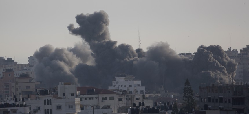 Smoke rises from an explosion after an Israeli airstrike in Gaza City, Sunday, May 5, 2019.