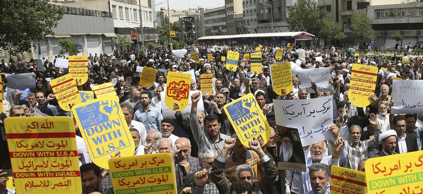 Worshippers chant slogans against the United States and Israel during a rally after Friday prayers in Tehran, Iran, Friday, May 10, 2019. 