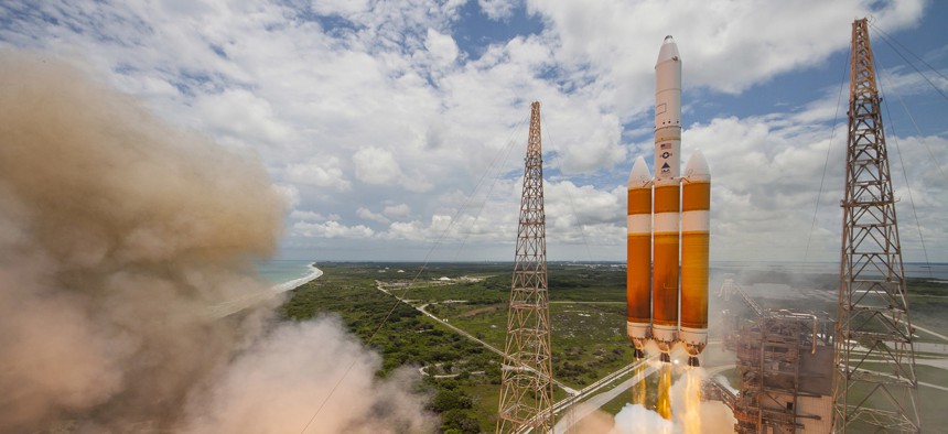 A United Launch Alliance Delta IV-Heavy rocket lifts off from Space Launch Complex 37B at Cape Canaveral Air Force Station, Florida.