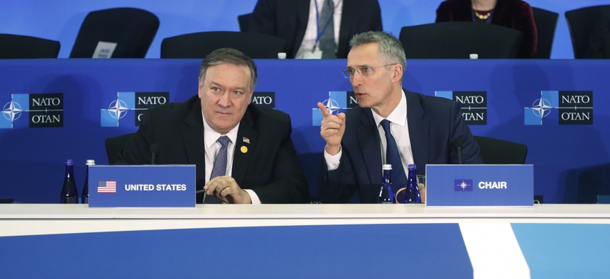 NATO's Secretary General Jen Stoltenberg, right, with Secretary of State Mike Pompeo, left, at the Meeting of the North Atlantic Council in Foreign Ministers' Session 2 at the U.S. State Department in Washington, Thursday, April 4, 2019.