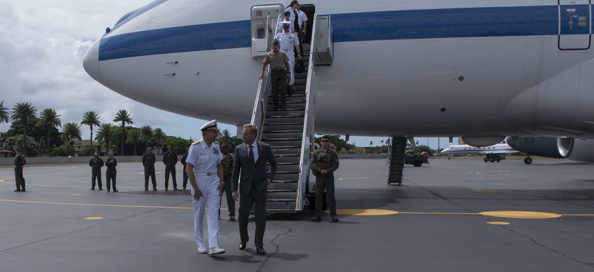 U.S. Acting Secretary of Defense Patrick M. Shanahan is greeted by the commander of U.S. Indo-Pacific Command, Navy Adm. Philip S. Davidson, upon arrival at Joint Base Pearl Harbor-Hickam, Hawaii, May 28, 2019.