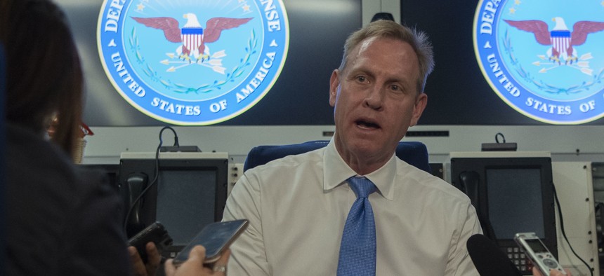 U.S. Acting Secretary of Defense Patrick M. Shanahan speaks with reporters aboard a government aircraft en route to South Korea, June 2, 2019.