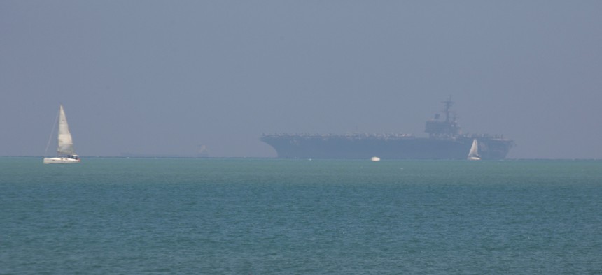 The United States' Navy USS George H.W. Bush aircraft carrier docks in the Mediterranean Sea off the coast of Haifa, Israel, Saturday, July 1, 2017.