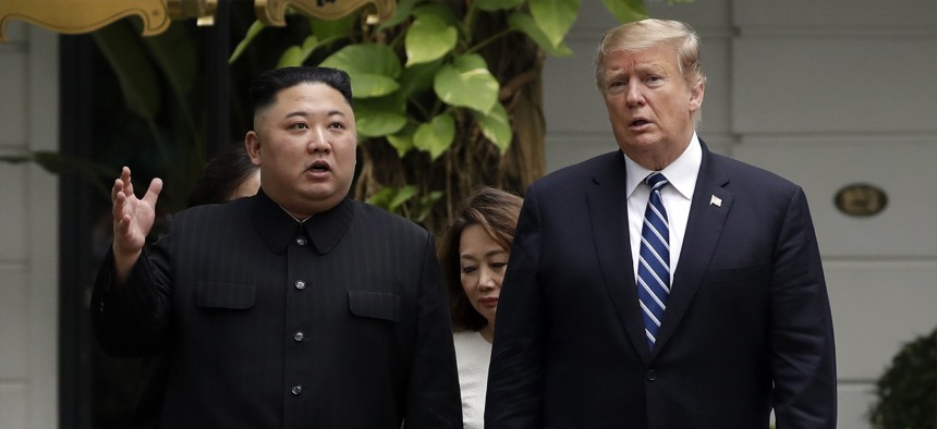 In this Feb. 28, 2019, file photo, U.S. President Donald Trump and North Korean leader Kim Jong Un take a walk after their first meeting at the Sofitel Legend Metropole Hanoi hotel in Hanoi, Vietnam.
