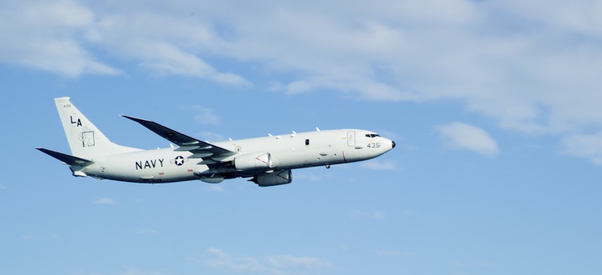 A P-8A Poseidon, assigned to the “Mad Foxes” of Patrol Squadron (VP) Five from Okinawa, Japan, flies over the Philippine Sea.