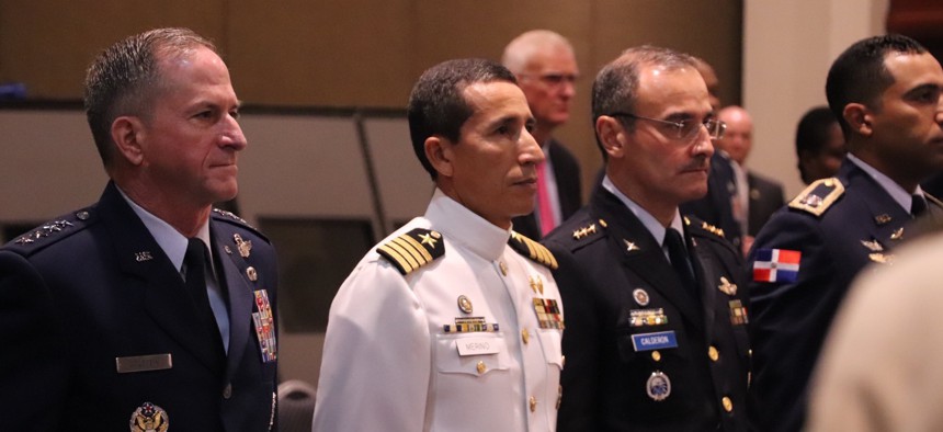 Gen. Dave Goldfein, the U.S. Air Force chief of staff and Col. Manuel Calderon, the El Salvador air chief at the Conference of the American Air Chiefs.