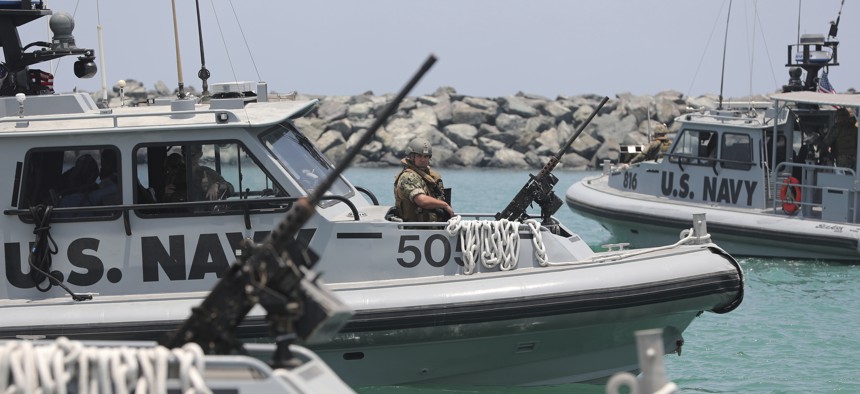 U.S. Navy patrol boats carrying journalists to see damaged oil tankers leaves a U.S. Navy 5th Fleet base near Fujairah, United Arab Emirates, Wednesday, June 19, 2019.