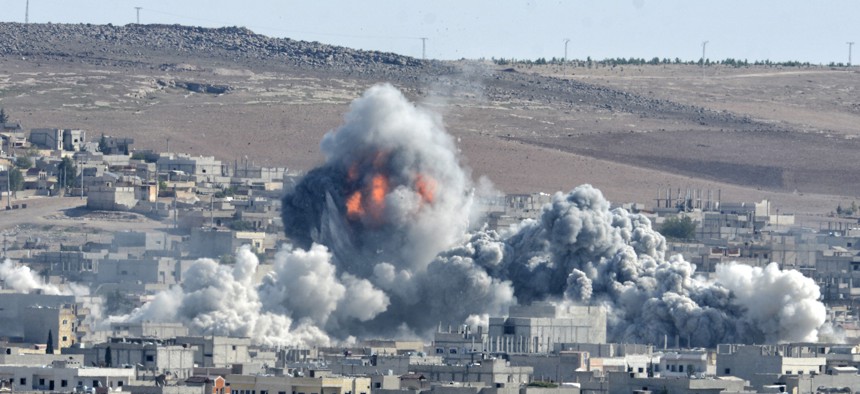 Coalition forces hitting an ISIS target in Syria's Kobani district on October 22, 2014.