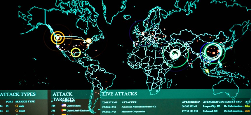 Real-time cyber attacks are displayed in 2017 on the 275th Cyberspace Squadron's operations floor, known as the Hunter's Den, at Warfield Air National Guard Base, Middle River, Md.