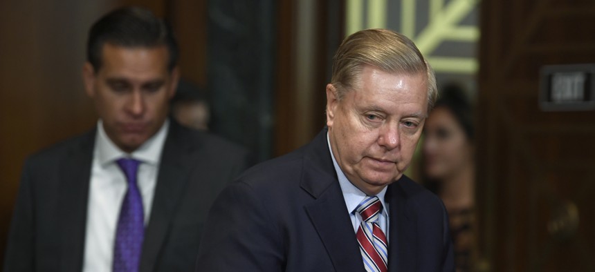 Senate Judiciary Committee Chairman Sen. Lindsey Graham, R-S.C.,arrives for a hearing with FBI Director Christopher Wray, on Capitol Hill in Washington, Tuesday, July 23, 2019. 