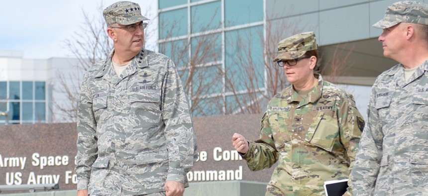 U.S. Air Force Gen. John Hyten, commander of U.S. Strategic Command, left, walks with U.S. Army Col. Kathryn Spletstoser, then director of his commander's action group director at  U.S. Army Space and Missile Defense Command in November 2017.