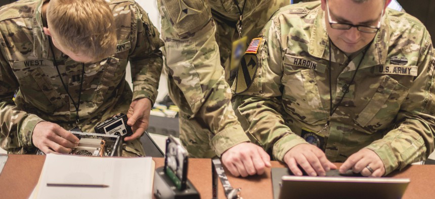 Members of the Illinois National Guard practice digital forensic skillsets during a Cyber Shield 19 training week class at Camp Atterbury, Ind. April 7, 2019. 