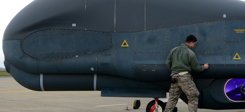 Staff Sgt. Seth Thurber, 69th Maintenance Squadron Detachment 1 RQ-4 Global Hawk avionics technician, checks panels during a preflight inspection Feb. 5, 2019, at Beale Air Force Base, California.