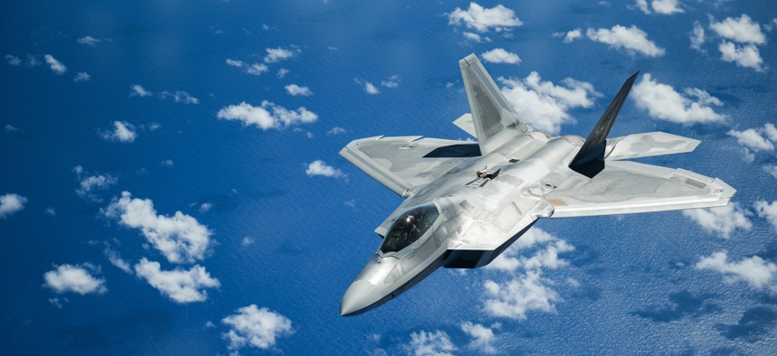 A United States Air Force F-22 Raptor from Joint Base Pearl Harbor-Hickam in Honolulu, Hawaii, flies over the Pacific Ocean during the Sentry Aloha exercise at Joint Base Pearl Harbor-Hickam, August 27, 2019. Aircraft from around the world took part.