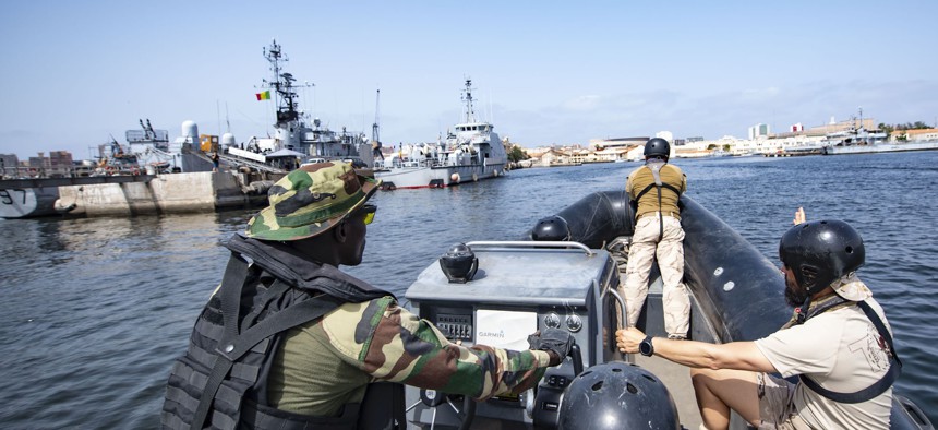 Senegalese, Portuguese, Spanish, and U.S. service members conduct small boat exercises in Dakar, Senegal, in the Gulf of Guinea in support of 2019 Africa Partnership Station on July 9, 2019.