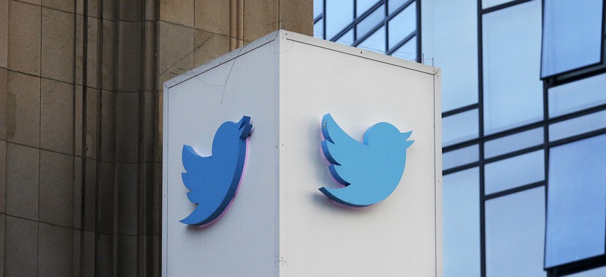 This Oct. 26, 2016 file photo shows a Twitter sign outside of the company's headquarters in San Francisco. Some political die-hards are getting caught up in an expanded effort by Twitter and other social media companies to crack down on nefarious tactics 
