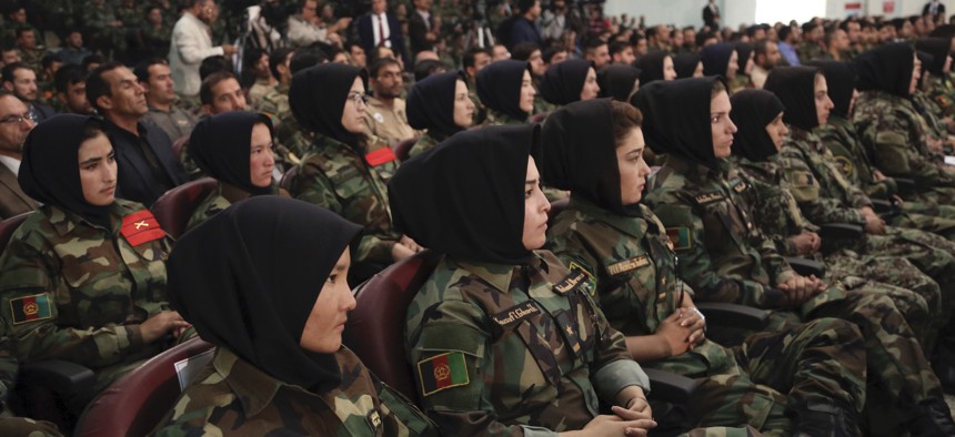 Afghan army soldiers listen to a speech by President Ashraf Ghani during a ceremony to introduce the new chief of the intelligence service, in Kabul, Afghanistan, Monday, Sept. 9, 2019.